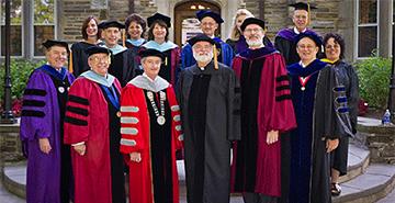 A group of Columbia University faculty at commencement.