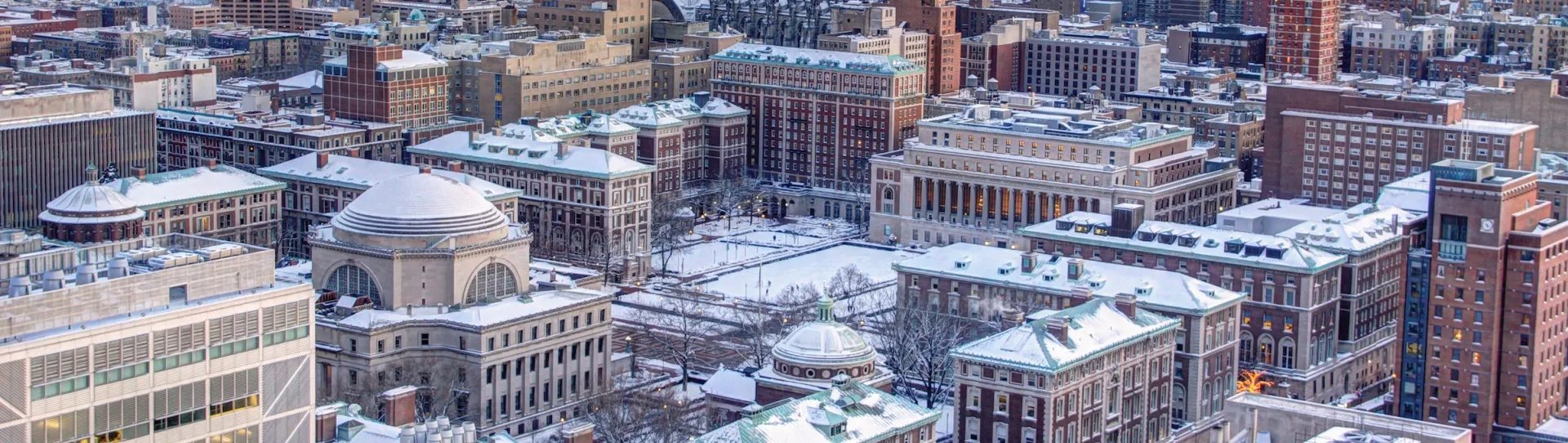 aerial shot of the Columbia University campus, covered in snow.