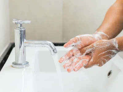 person washing hands